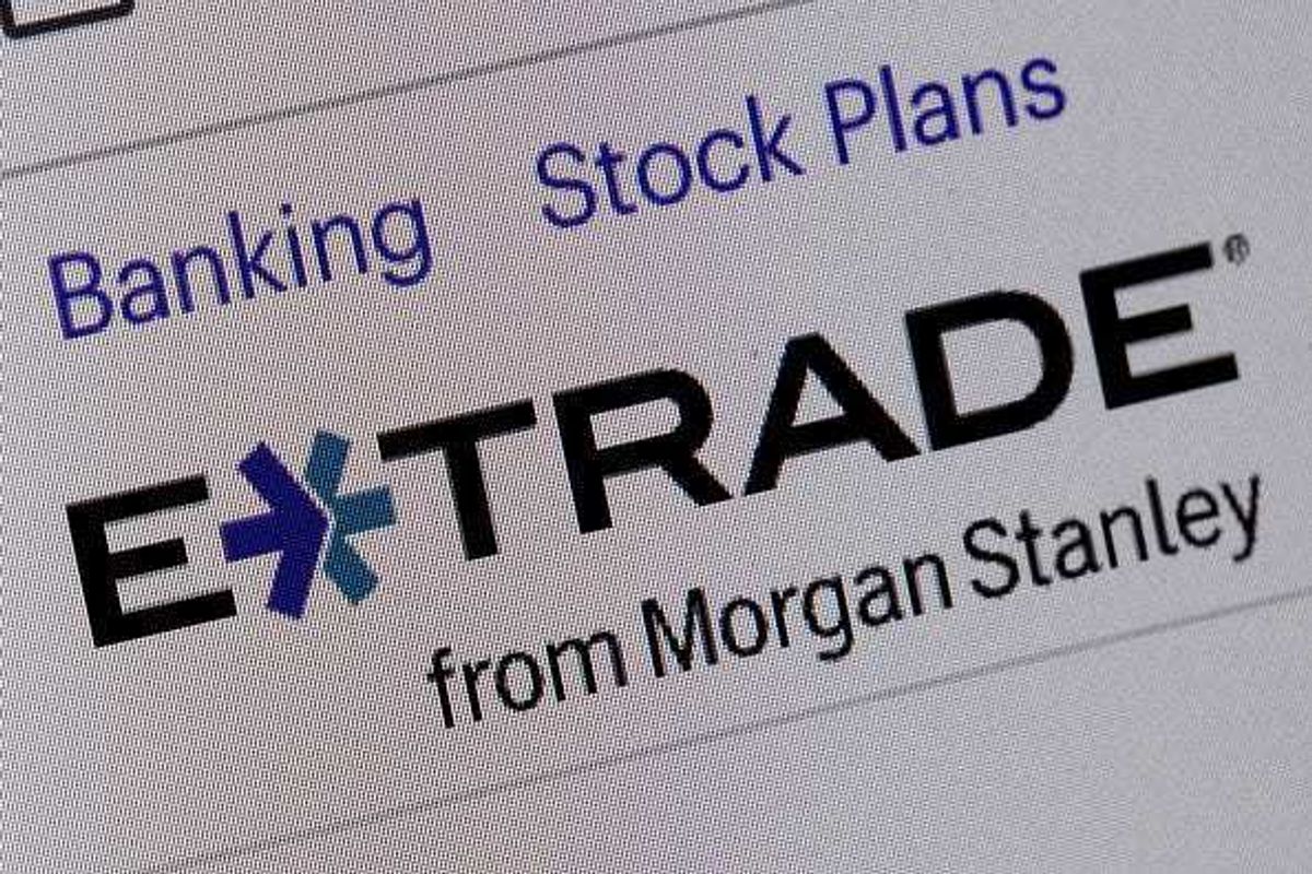 In this photo illustration, the logo for E-Trade, the online trading platform owned by Morgan Stanley, is shown on the company's website on May 13, 2024 in Chicago, Illinois.