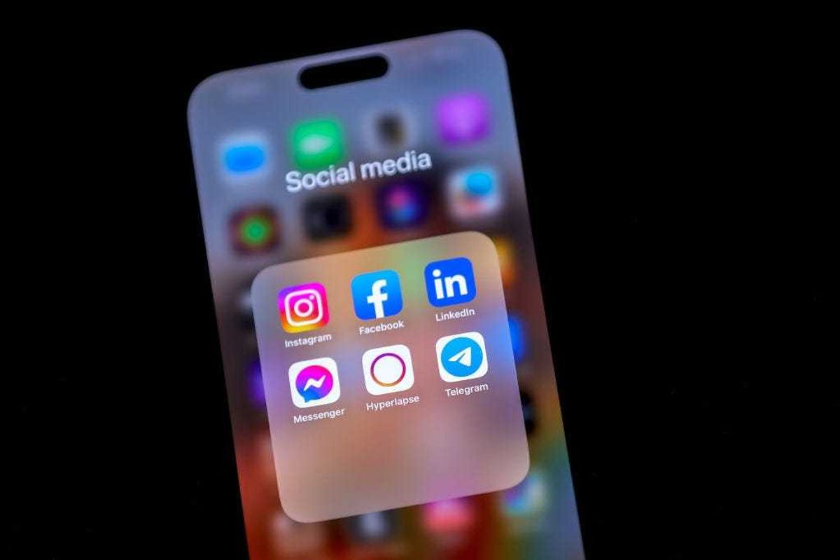 In this photo illustration, the logos of social media applications Instagram, Facebook, LinkedIn, Messenger, Hyperlapse and Telegram are displayed on a cellphone screen.
