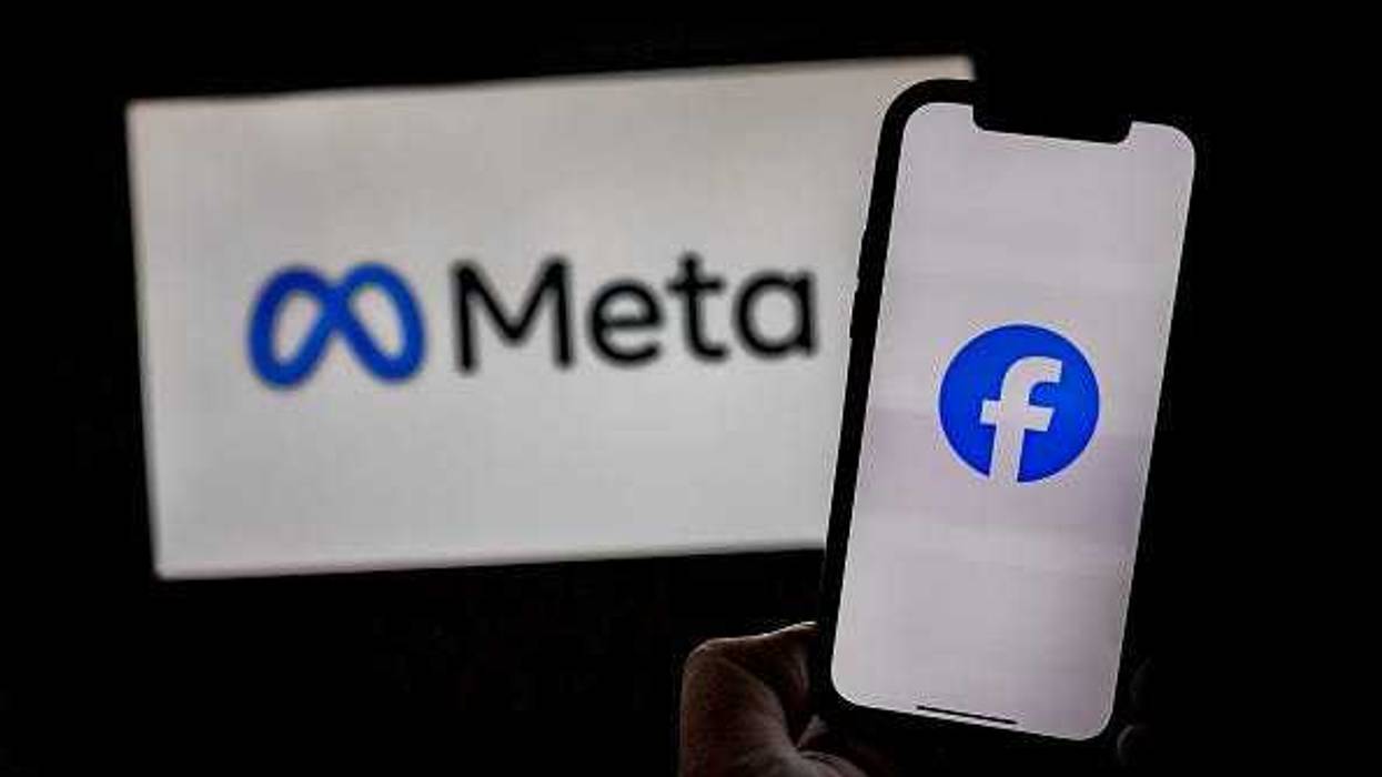 In this photo illustration, the Meta and Facebook logos are seen on screens on January 08, 2025 in Santa Rosa, Philippines. Meta has announced the discontinuation of its fact-checking program, transitioning to a community-driven model that relies on users to add context to potentially misleading posts, a move aimed at promoting free expression. This significant policy shift has raised concerns among experts about the potential increase in misinformation and hate speech on Meta's platforms, including Facebook and Instagram, as the company prepares for a new political landscape under the upcoming Trump presidency.