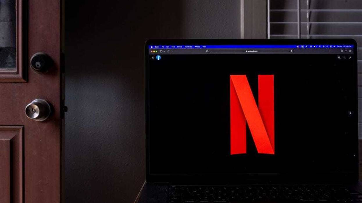In this photo illustration, the Netflix emblem is shown on a laptop on April 19, 2022 in Houston, Texas. The company Netflix is expected to report its first-quarter earnings after the close of trading later today. The report will be for the fiscal Quarter ending March 2022. (Photo Illustration by Brandon Bell/Getty Images)