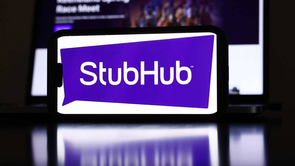 In this photo illustration, the StubHub logo and webpage are displayed on a cell phone and computer monitor in Los Angeles, California.
