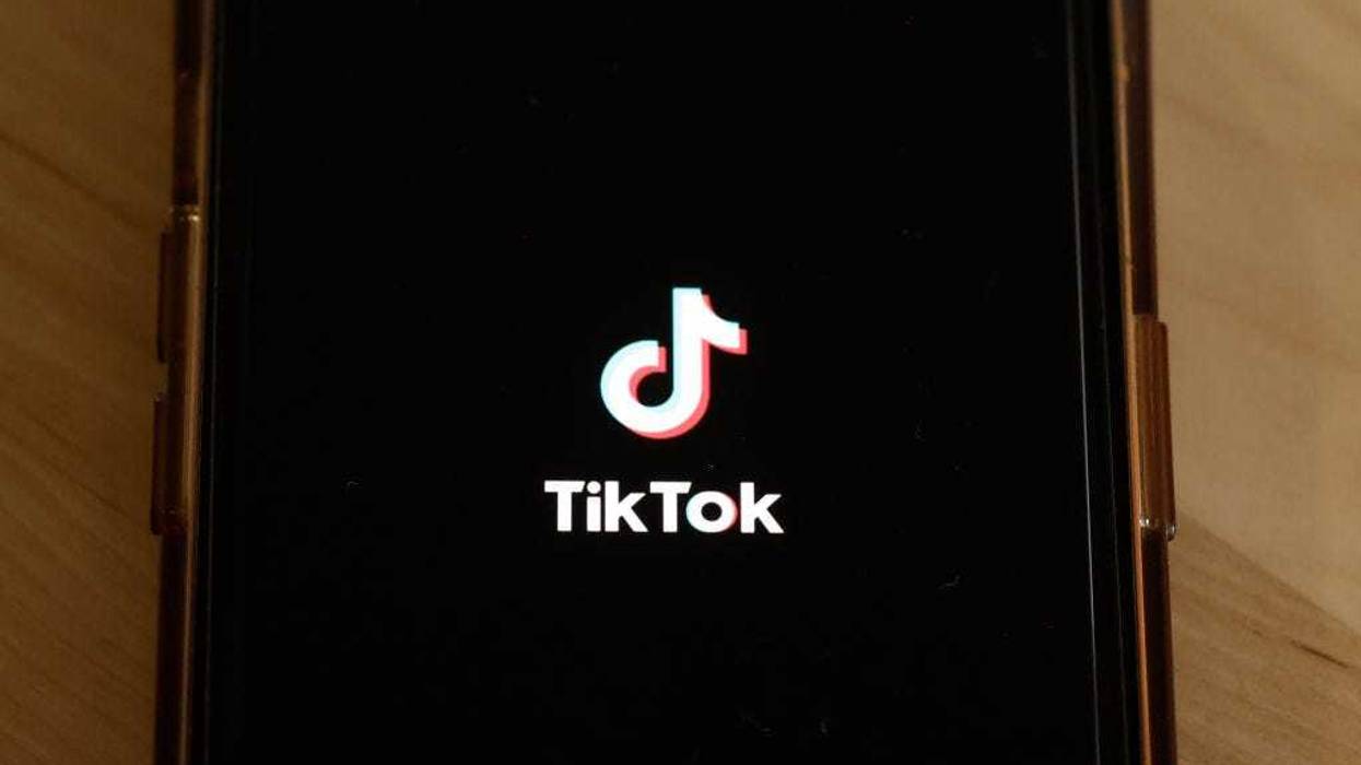In this photo illustration, the TikTok app is seen on a phone on March 13, 2024 in New York City. Congress is set to vote and pass a bill that could ban the popular app TikTok nationwide and be sent to the Senate for a vote. The bill would force the Chinese firm ByteDance to divest from TikTok and other applications that it owns within six months after passage of the bill or face a ban. Lawmakers argue that ByteDance is beholden to the Chinese government making the app a national security threat. (Photo Illustration by Michael M. Santiago/Getty Images)