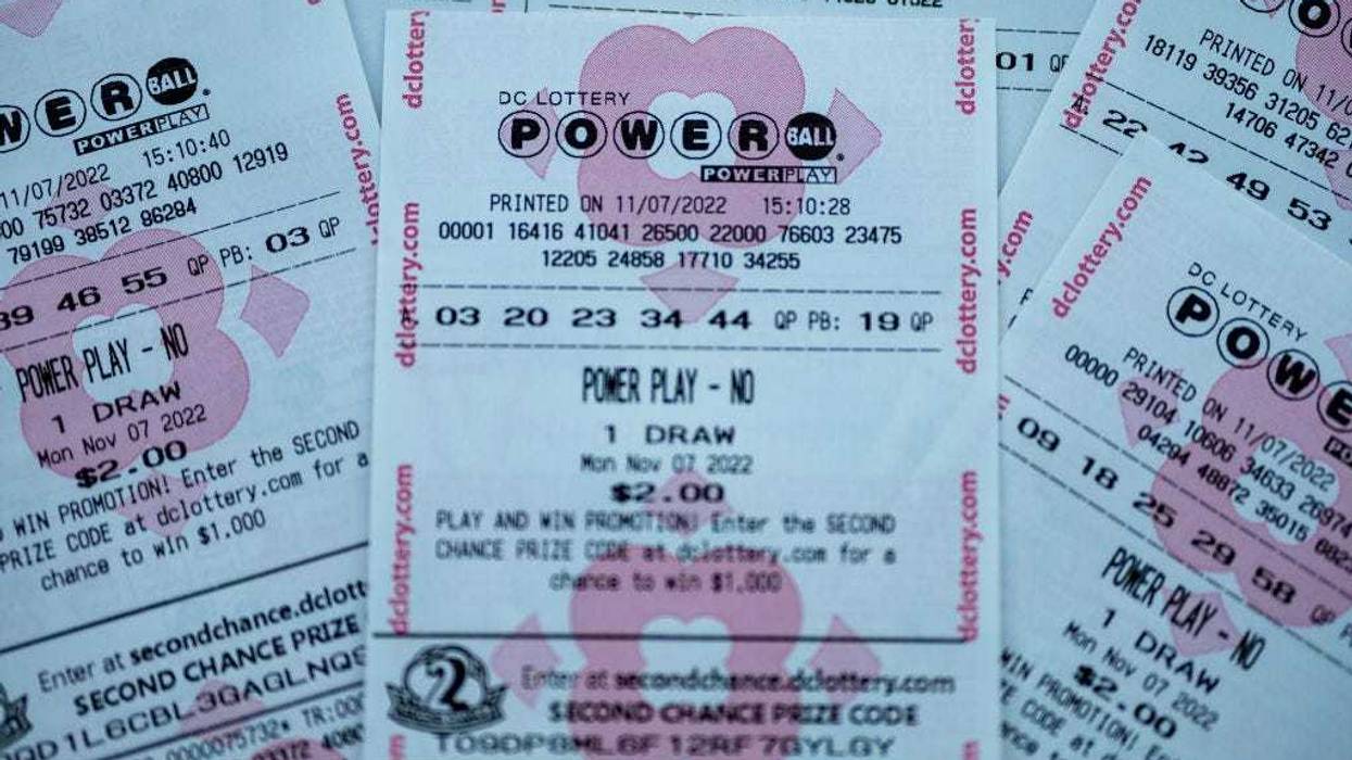In this photo illustration, tickets for the upcoming Powerball lottery are seen on November 07, 2022 in Washington, DC. The estimated Powerball jackpot for the November 7th drawing has increased to $1.9 billion, with an estimated lump sum payment of $929.1 million. (Photo illustration by Tasos Katopodis/Getty Images)