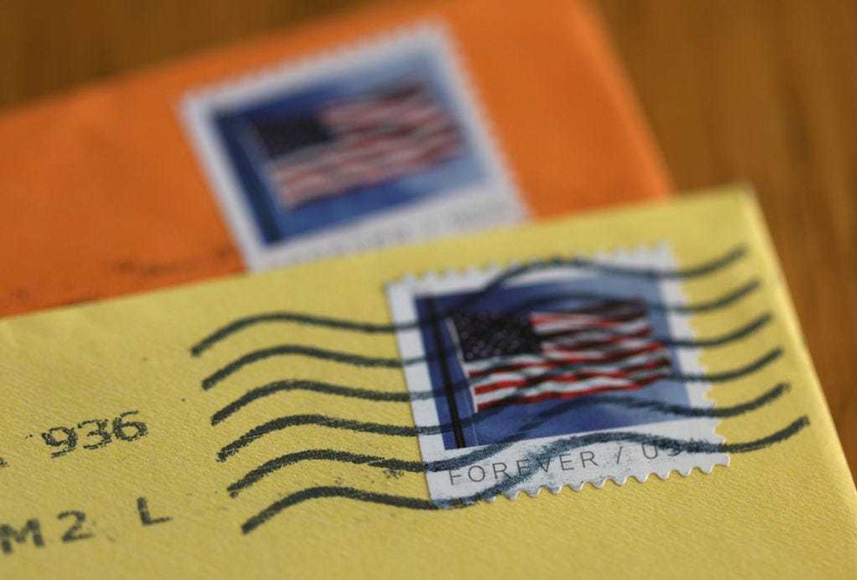 In this photo illustration, U.S. Postal Service (USPS) forever stamps are seen on envelopes on April 11, 2023.