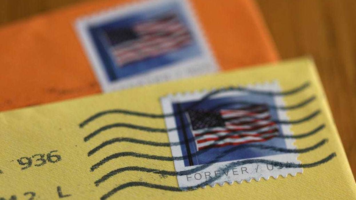 In this photo illustration, U.S. Postal Service (USPS) forever stamps are seen on envelopes on April 11, 2023.