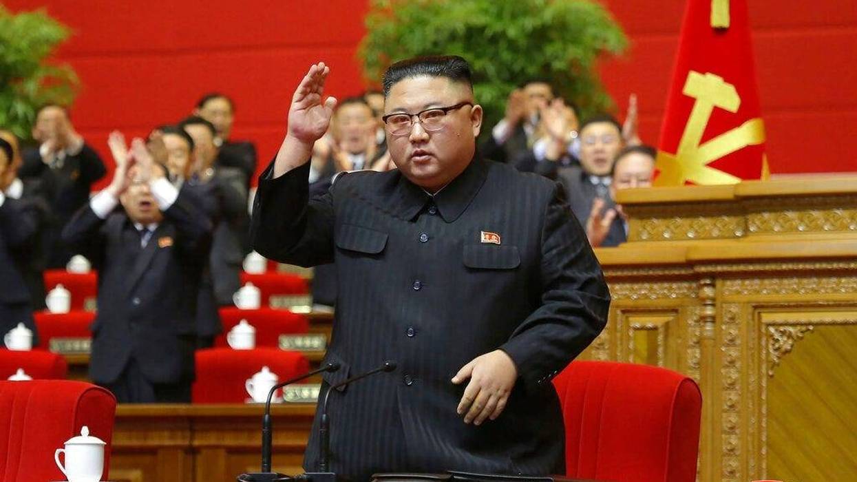 In this photo provided by the North Korean government, North Korean leader Kim Jong Un acknowledges to the applauds after he made his closing remarks at a ruling party congress in Pyongyang, North Korea Tuesday, Jan. 12, 2021.