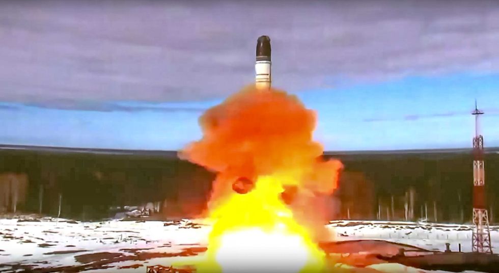 In this photo provided by the Roscosmos Space Agency Press Service on Wednesday, April 20, 2022, the Sarmat intercontinental ballistic missile is launched from Plesetsk, in northwestern Russia