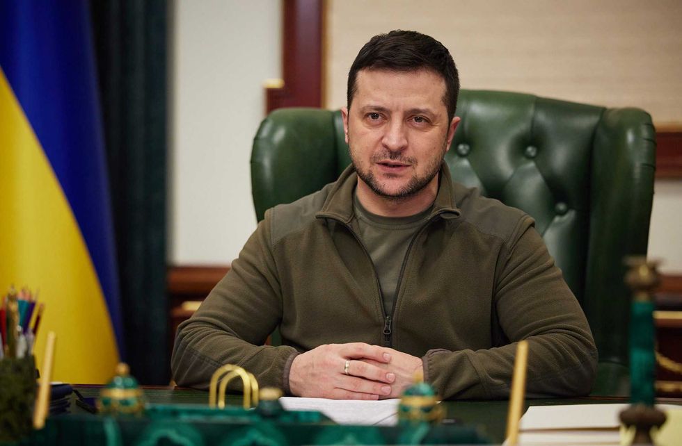 In this photo provided by the Ukrainian Presidential Press Office, Ukrainian President Volodymyr Zelenskyy addresses the nation in Kyiv, Ukraine, late Monday, March 7, 2022
