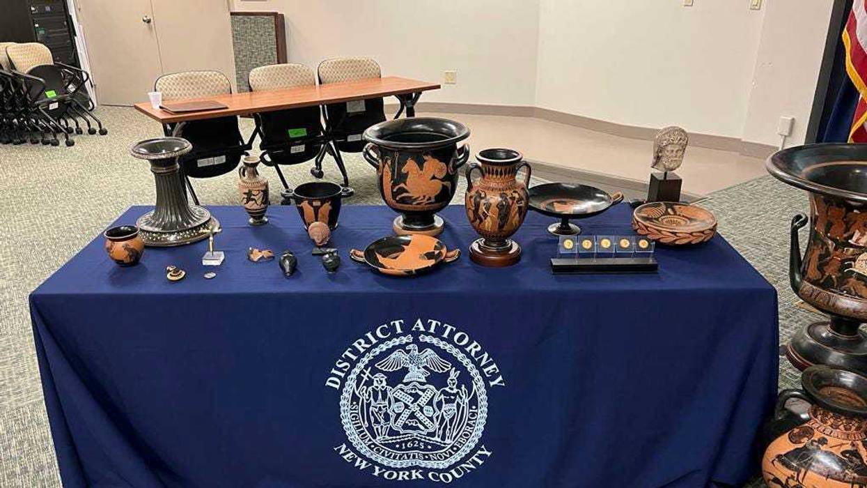In this picture made available by the Italian Carabinieri, paramilitary police, Friday, Aug. 11, 2023, some of the 266 antiquities returned from the United States to Italy are displayed during a handing over ceremony to the offices of the Manhattan district attorney.