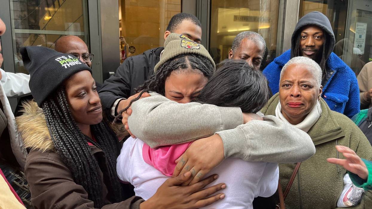 India Spellman hugs her mom after being released from prison custody on Feb. 9, 2023. A judge has dismissed her 2013 murder conviction.