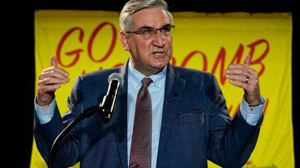 Indiana Gov. Eric Holcomb addresses supporters after winning his second term as governor in Indianapolis, Tuesday, Nov. 3, 2020.