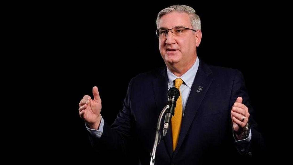 Indiana Republican Gov. Eric Holcomb participates in the Indiana Gubernatorial debate with Democrat Woody Myers and Libertarian Donald Rainwater, Tuesday, Oct. 27, 2020, in Indianapolis. The candidates were in separate studios to allow for social distancing guidelines.