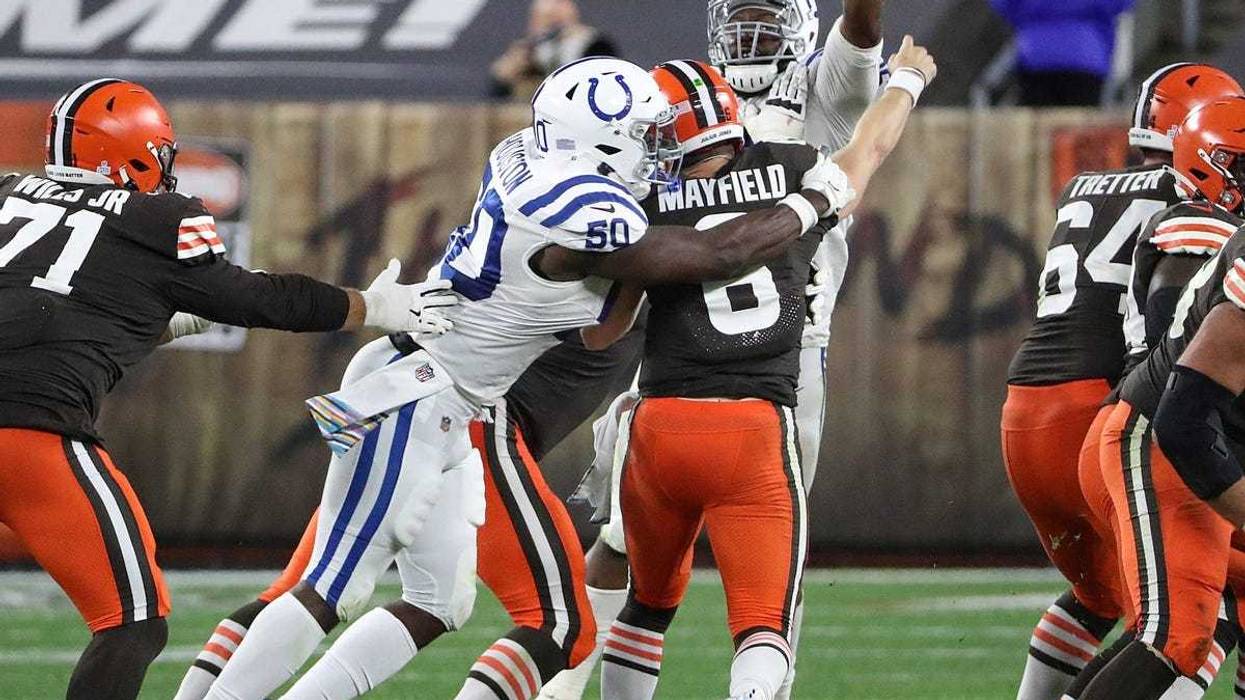 Indianapolis Colts defensive end Justin Houston (50) tackles Cleveland Browns quarterback Baker Mayfield (6) as he passes, which led to an interception by Colts middle linebacker Anthony Walker (54) during the fourth quarter of the NFL week 5 game at First Energy Stadium in Cleveland, Ohio, on Sunday, Oct. 11, 2020. The Browns won, 32-23. Indianapolis Colts At Browns At First Energy Stadium In Nfl Week 5 Cleveand Ohio Sunday Oct 11 2020