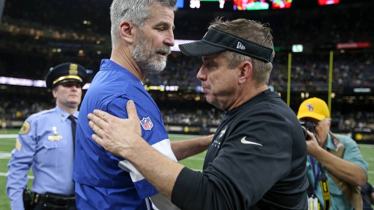 Indianapolis Colts head coach Frank Reich talks to New Orleans Saints head coach Sean Payton after their game at the Mercedes-Benz Superdome