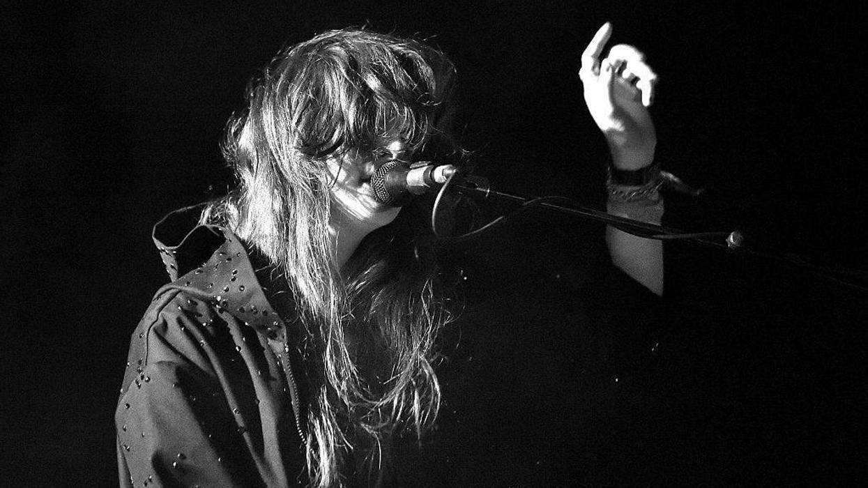 INDIO, CA - APRIL 24: (EDITORS NOTE: Image has been converted to black and white.) Musician Victoria Legrand of Beach House performs onstage during day 3 of the 2016 Coachella Valley Music & Arts Festival Weekend 2 at the Empire Polo Club on April 24, 201