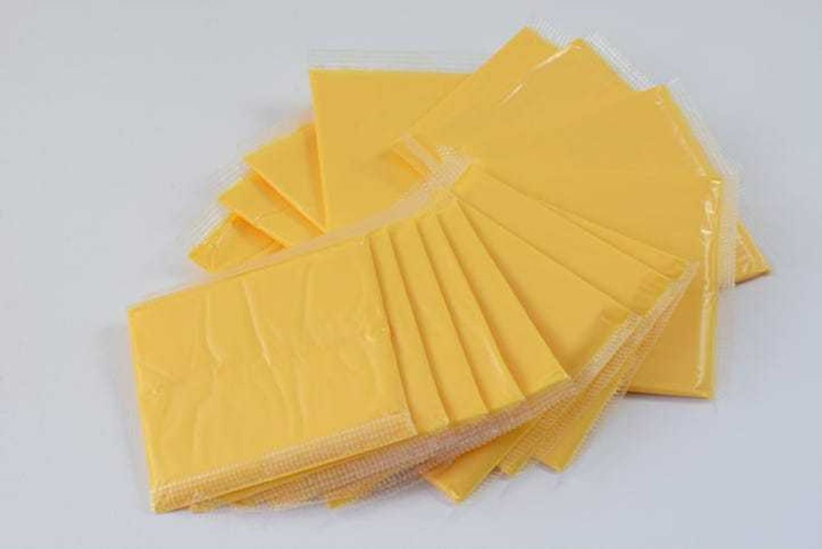 Individually wrapped slices of American cheese.