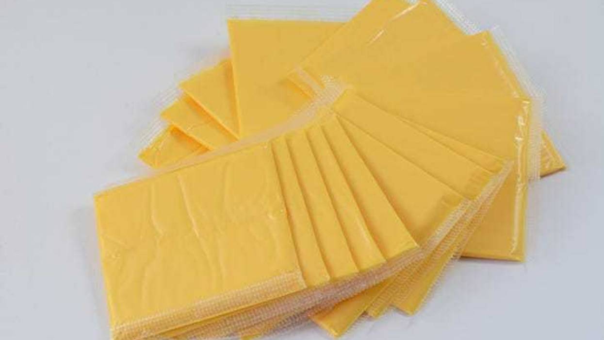 Individually wrapped slices of American cheese.