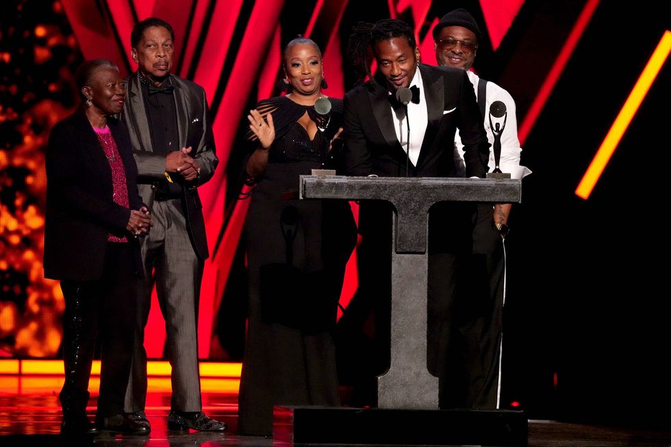 Inductee Q-Tip (2nd from R) of A Tribe Called Quest speaks onstage at the 2024 Rock & Roll Hall Of Fame Induction Ceremony at Rocket Mortgage Fieldhouse on October 19, 2024 in Cleveland, Ohio.