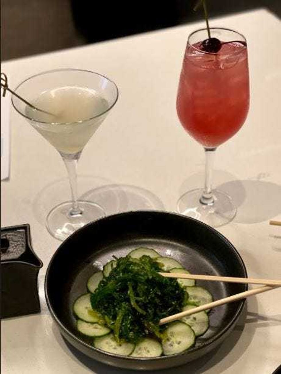 Indulging in the seaweed salad appetizer from Zeta Asia along with some delicious drinks!