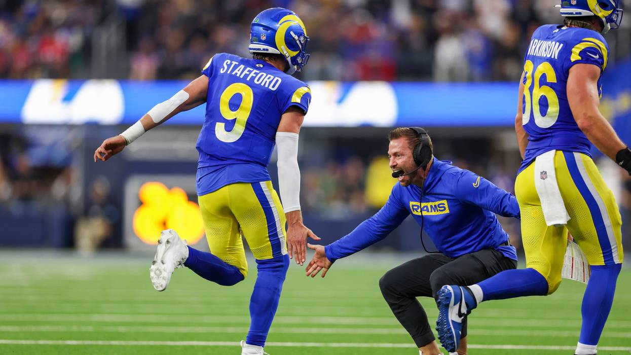 INGLEWOOD, CALIFORNIA - DECEMBER 08: Head coach Sean McVay of the Los Angeles Rams high-fives Matthew Stafford #9 after a touchdown in the fourth quarter of a game against the Buffalo Bills at SoFi Stadium on December 08, 2024 in Inglewood, California.