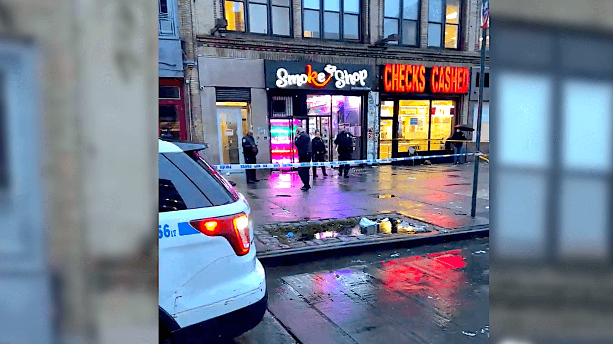 Investigators blocked off an area of sidewalk on Lenox Avenue following the shooting Tuesday morning