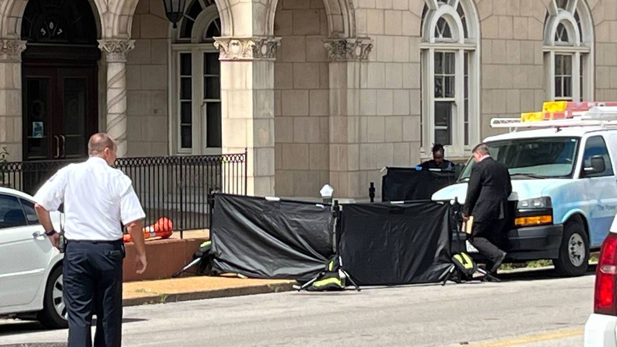 Investigators on the scene of a shooting near the Saint Louis University Campus