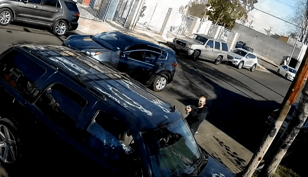 Investigators with the Los Angeles Police Department released surveillance video showing the masked shooter of a 16-year-old boy in South Los Angeles on Feb. 2, 2022.