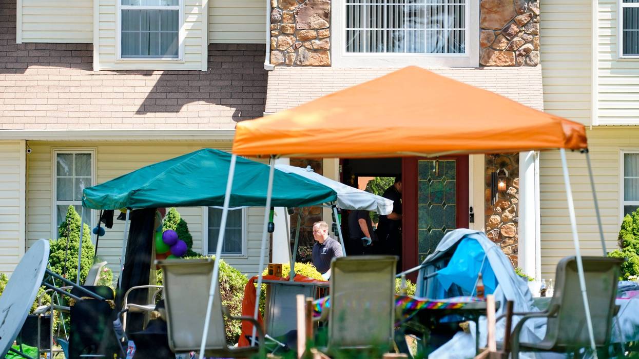 Investigators works the scene of a shooting in Fairfield Township, N.J., Sunday, May 23, 2021.