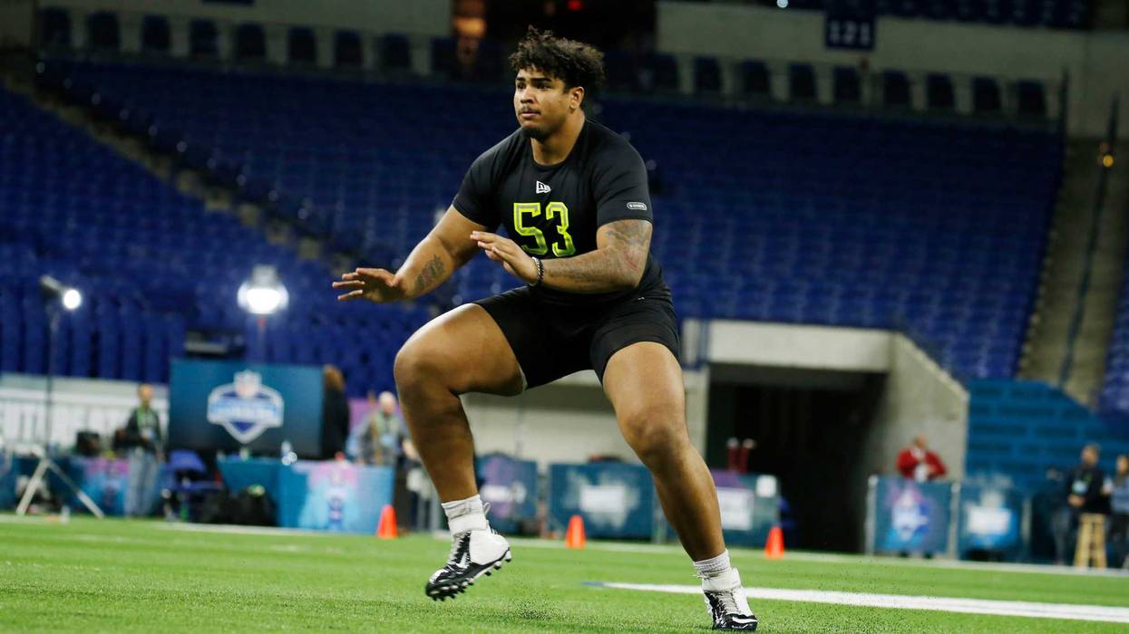 Iowa Hawkeyes offensive lineman Tristan Wirfs (OL53) goes through a workout drill during the 2020 NFL Combine at Lucas Oil Stadium.