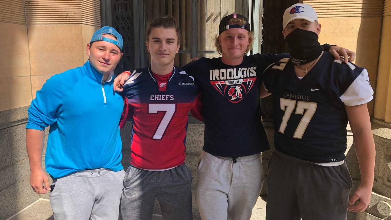 Iroquois football players gather outside Buffalo City Hall and push for state to allow high-impact sports like football to begin in the fall. September 19, 2020