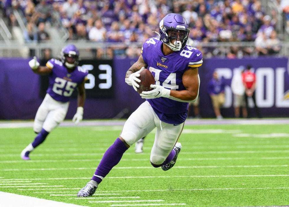 Irv Smith Jr. turns upfield.