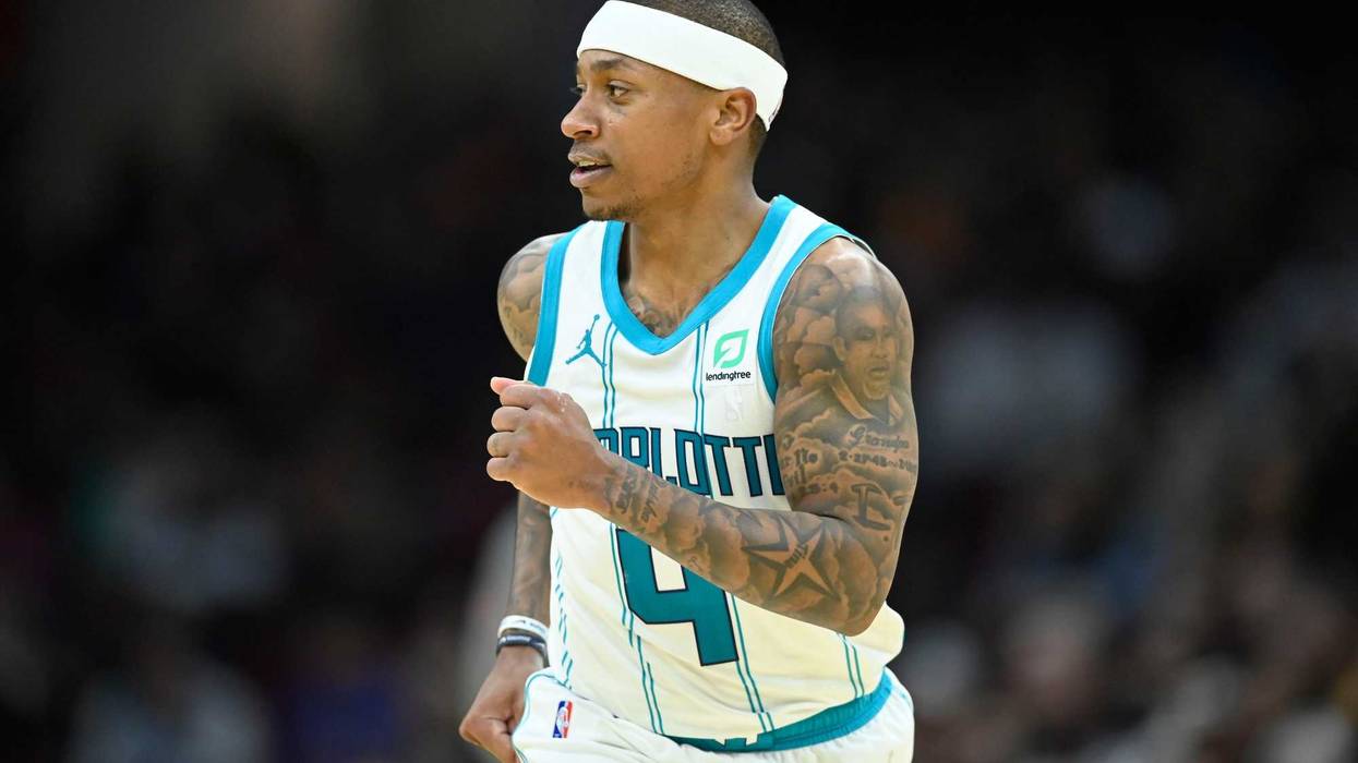 Isaiah Thomas looks to get open for a Hornets teammate