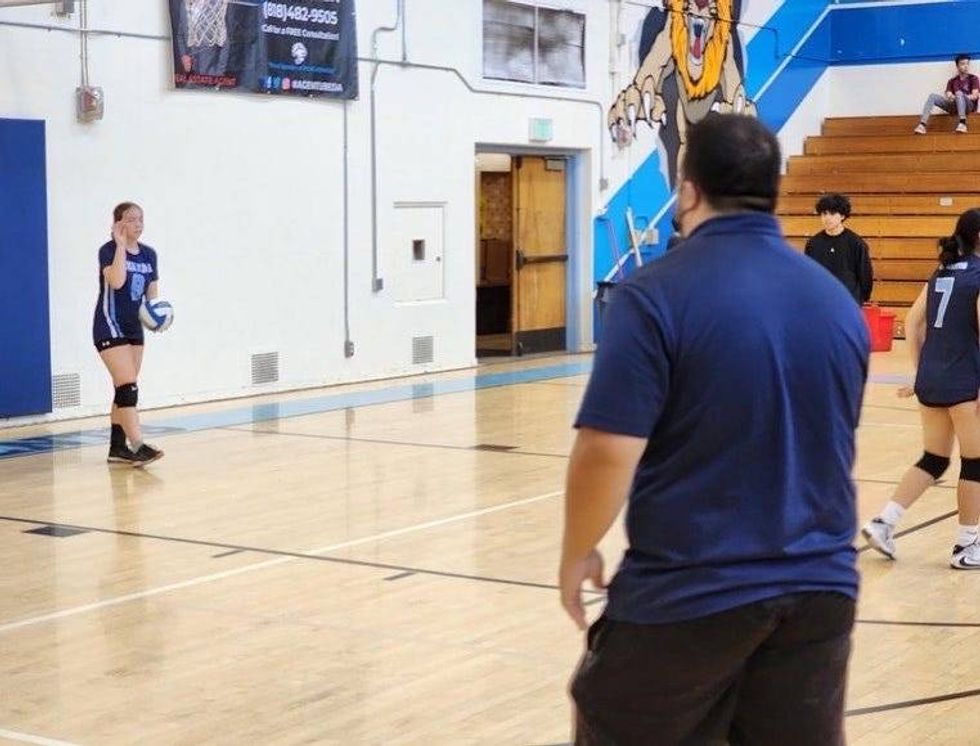 Isebiu Reyes “Coach Boo”