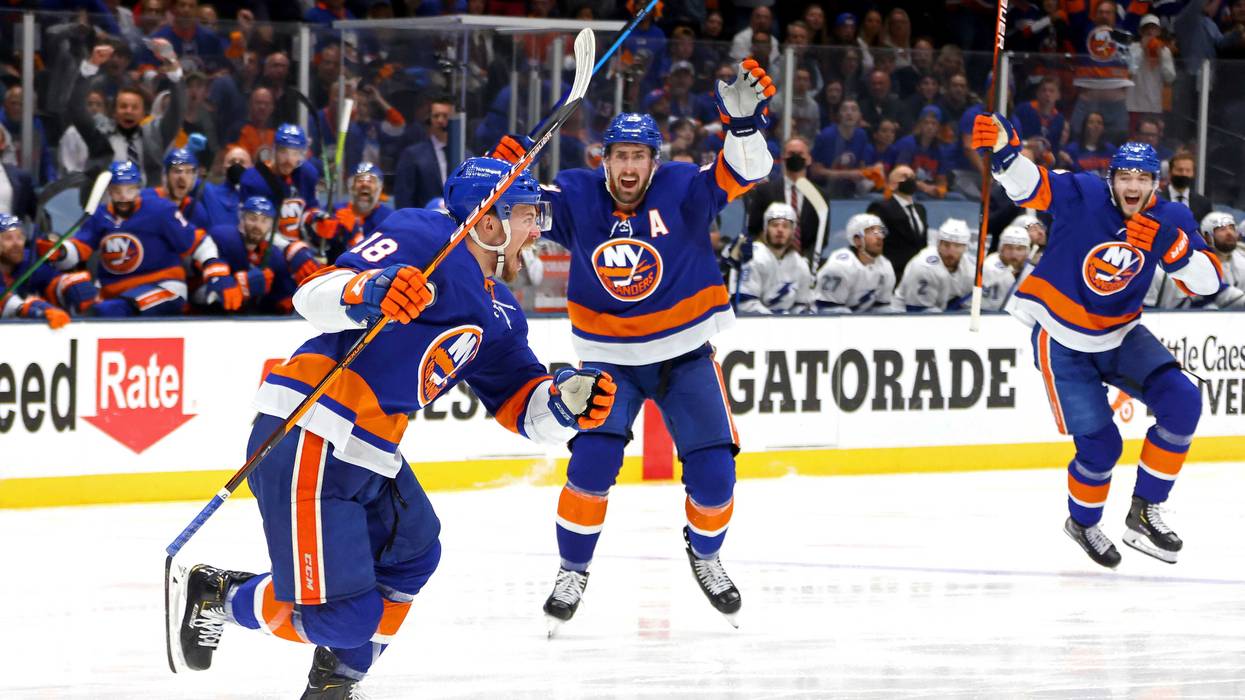 Islanders celebrate an overtime win.