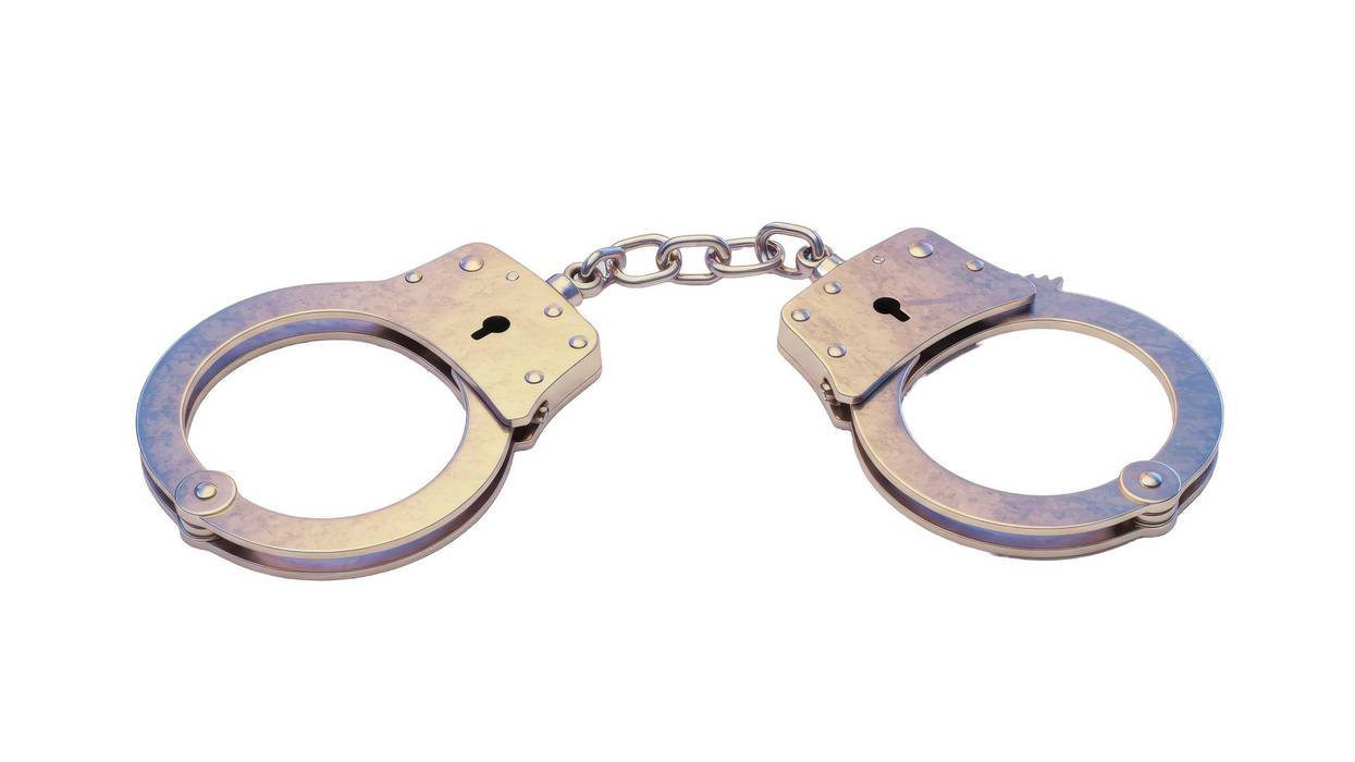 Isolated Silver Handcuffs for Law Enforcement and Security