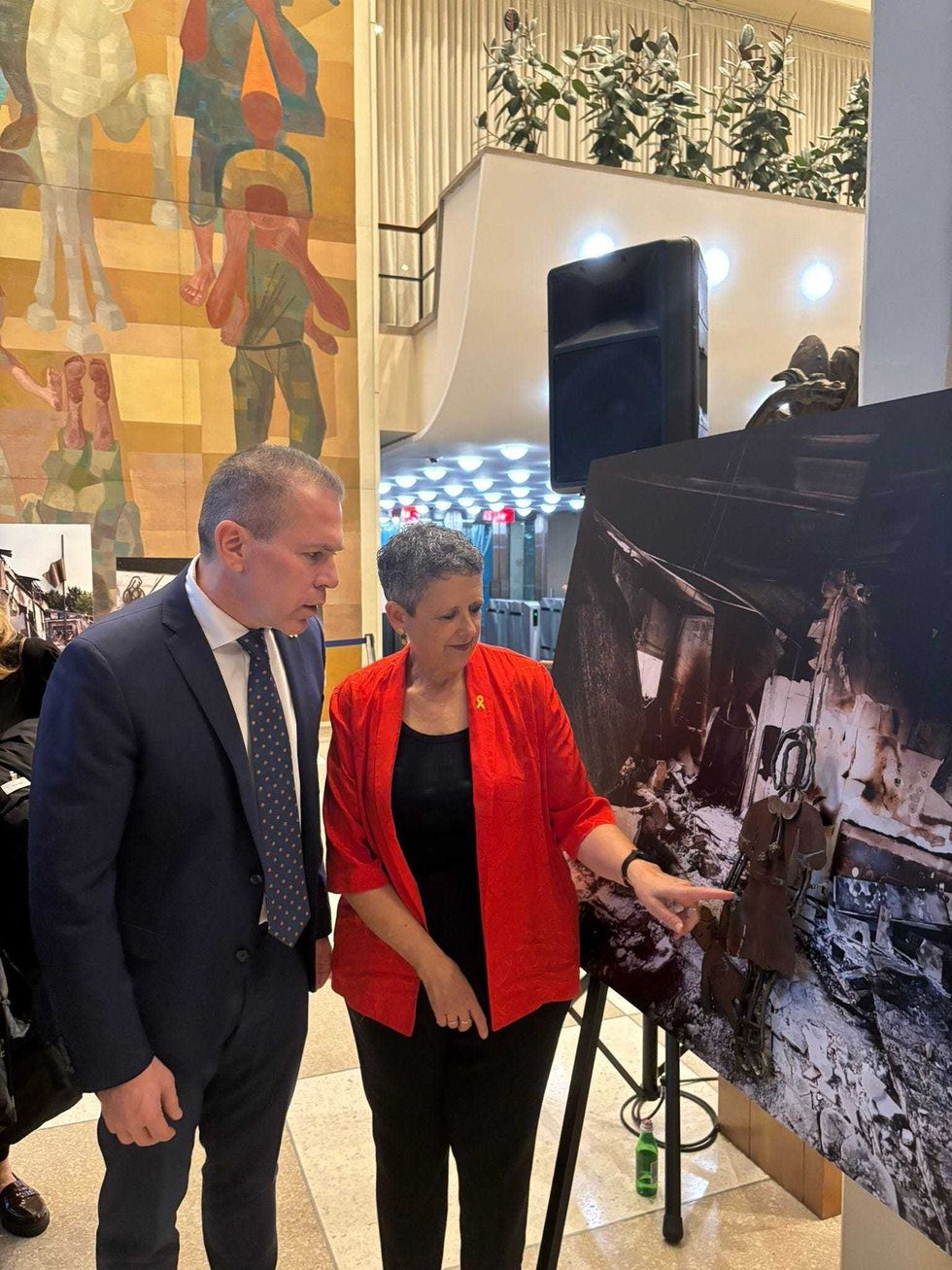 Israel ambassador to the United Nation Gilad Erdan with artist Orna Ben-Ami, at the inauguration of the "Negative Positive" art exhibition at the United Nations on April 2, 2024.