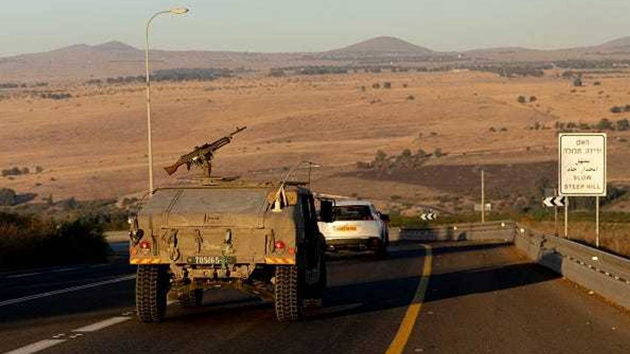 Israeli army vehicles move through the north on September 26, 2024 in Northern Israel, Israel.