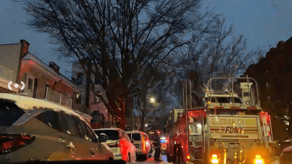 It took firefighters under an hour to control the blaze but the FDNY said their response was inhibited by parked cars that were blocking the two closest fire hydrants.