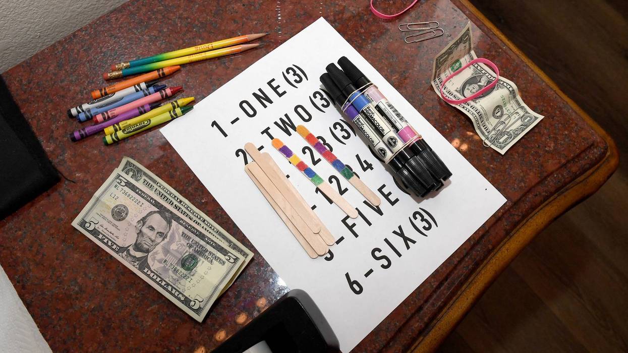 Items for magic tricks are organized before a Facebook Live event held by creative director/magician Douglas "Lefty" Leferovich and magician/comedian Murray SawChuck.
