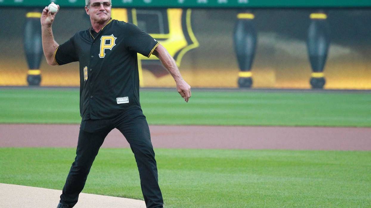 ittsburgh Pirates former center fielder Andy Van Slyke throws out an honorary first pitch before the game against the St. Louis Cardinals at PNC Park.