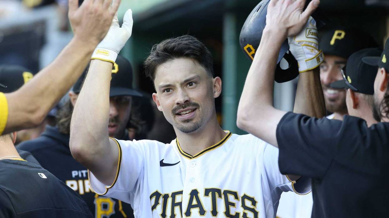 ittsburgh Pirates left fielder Bryan Reynolds (10) celebrates his solo home run against the Chicago Cubs