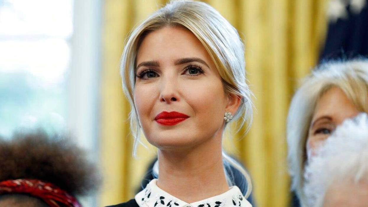 Ivanka Trump stands before President Donald Trump signs a memorandum to expand access to STEM, science technology engineering and math, education, in the Oval Office of the White House in Washington