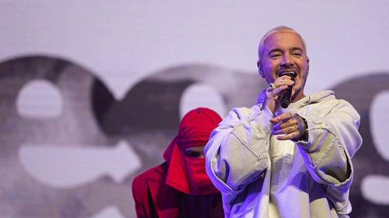 J Balvin sings on stage
