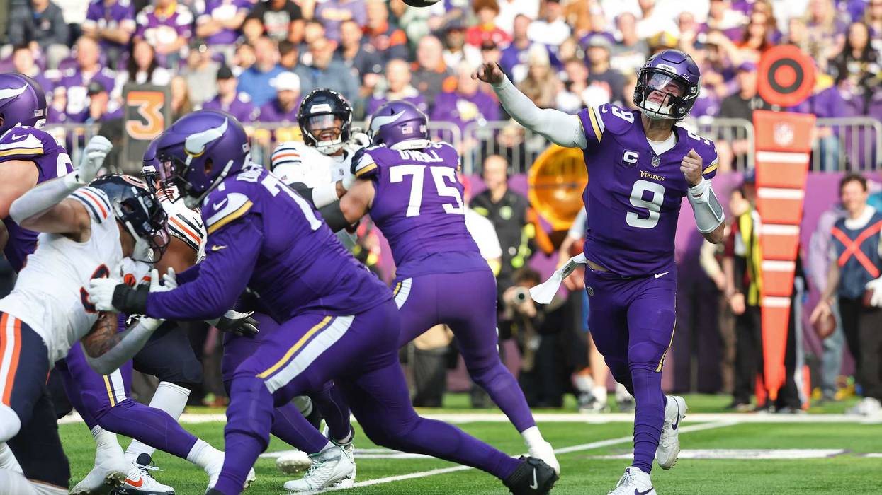 J.J. McCarthy #9 of the Minnesota Vikings throws a pass against the Chicago Bears during the first quarter at U.S. Bank Stadium on November 16, 2025 in Minneapolis, Minnesota.