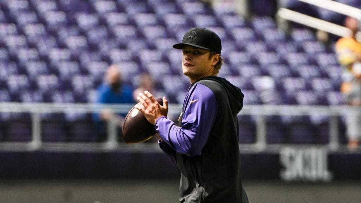 J.J. McCarthy #9 of the Minnesota Vikings warms up before the preseason game against the Las Vegas Raiders at U.S. Bank Stadium on August 10, 2024 in Minneapolis, Minnesota.