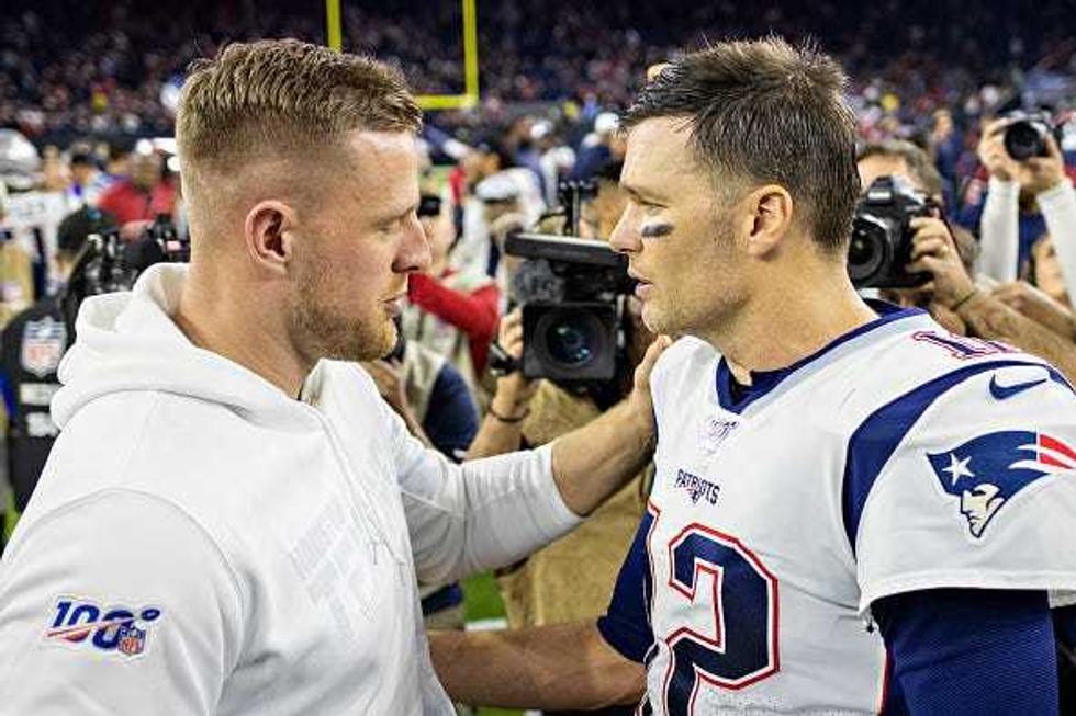J.J. Watt and Tom Brady after a game.