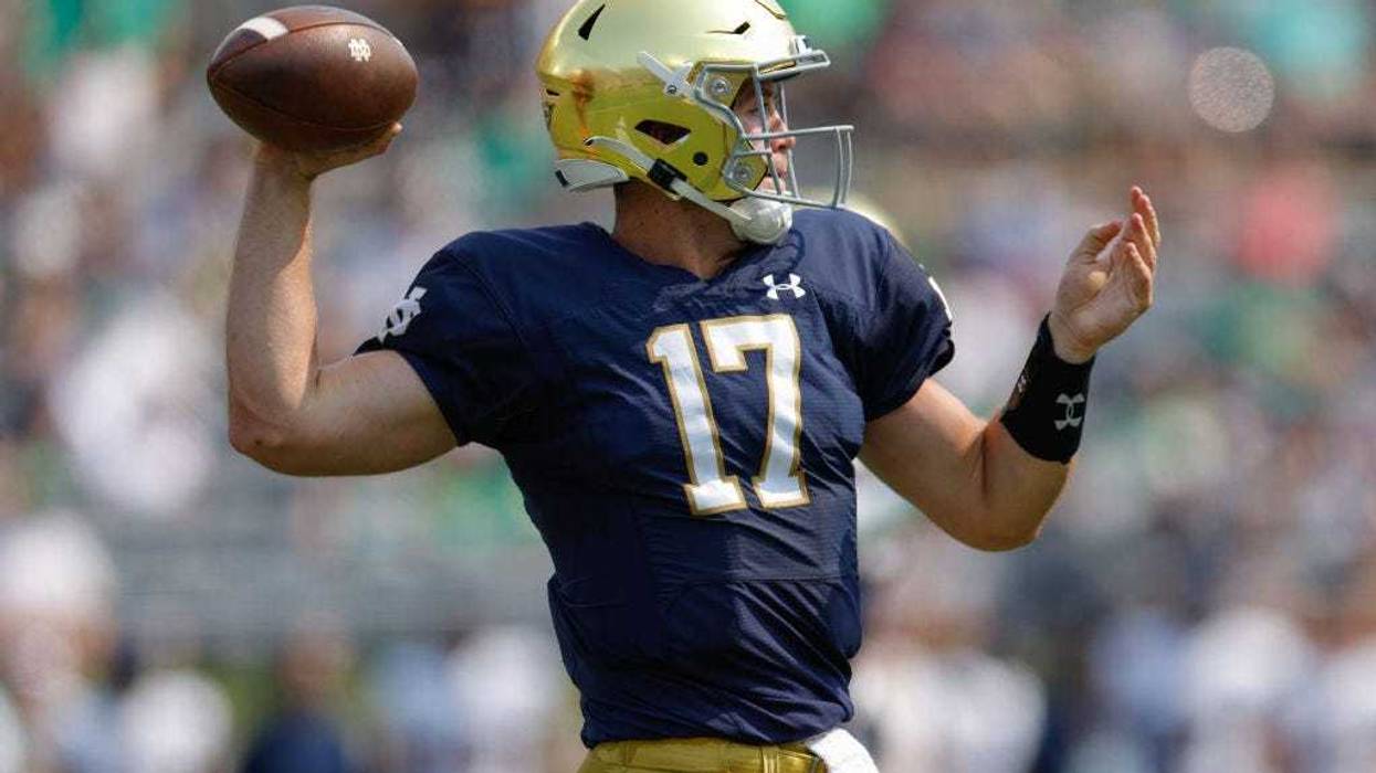 Jack Coan #17 of the Notre Dame Fighting Irish throws the ball during the first half against the Toledo Rockets at Notre Dame Stadium on September 11, 2021 in South Bend, Indiana.
