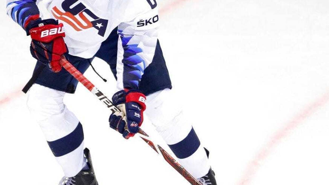 Jack Hughes passes the puck during an Ice Hockey World Championships