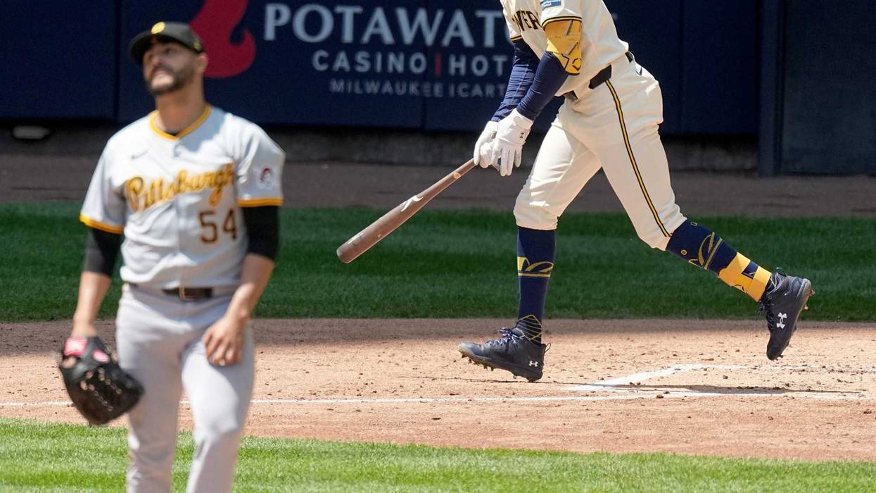 Jackson Chourio (11) hits a two-run home run off of Pittsburgh Pirates pitcher Martín Pérez (54) during the sixth inning of their game
