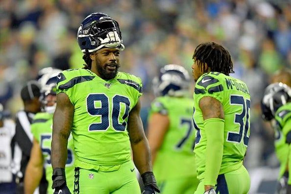 Jadeveon Clowney chats with Bradley McDougald